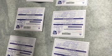 Policía Nacional en puerto plata  apresa a propietaria de farmacia  por falsificación de tarjetas de vacunación contra el Covid
